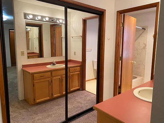 Master suite's dressing area and bath.