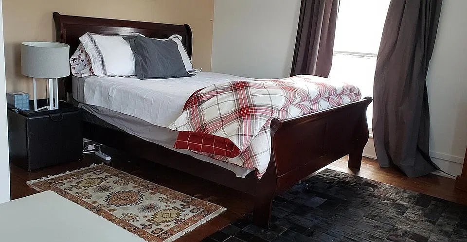 Master Bedroom with winter linens and Horsehair rug and imported Turkish rug.