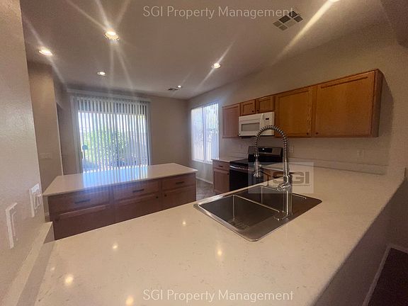5th image of 7052 E Keats Ave