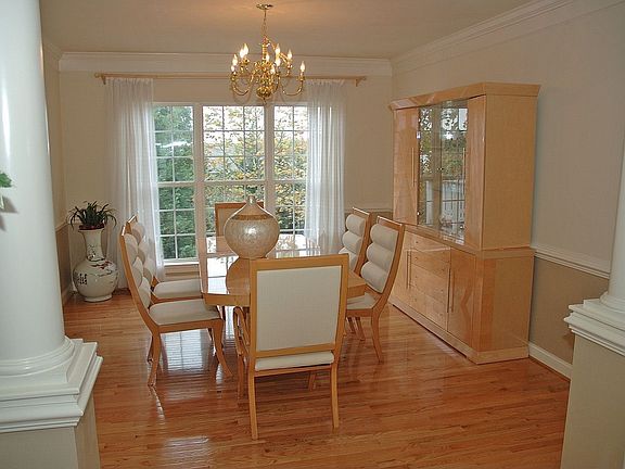 Separate dining room with hardwoods