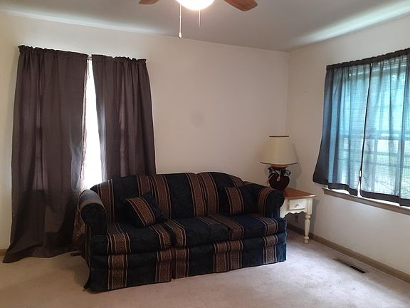 Beige carpet and walls.