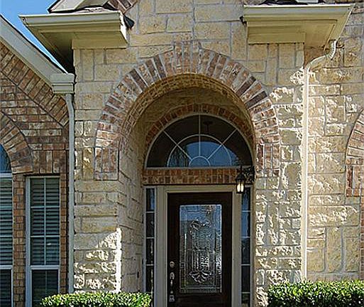 Beautifully landscaped home with great stone elevation