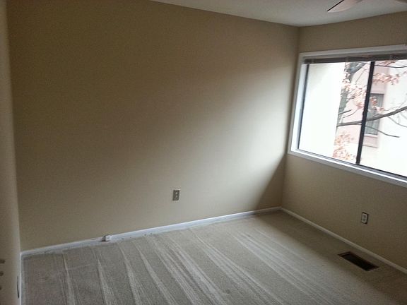 Bright bedroom w/new carpets (not pictured - see next picture w/mirrors for new carpet color/condition)
