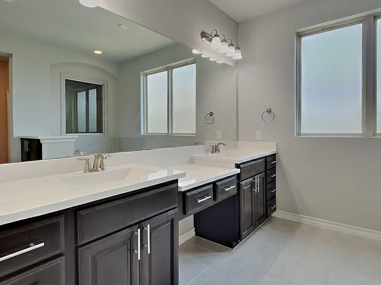 Brightly lit bathroom with mod