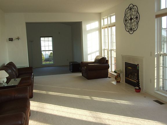 Family room opening to step down Media room