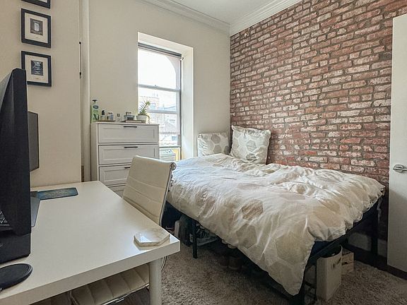 5th image of 50 E 3rd St APT 4B