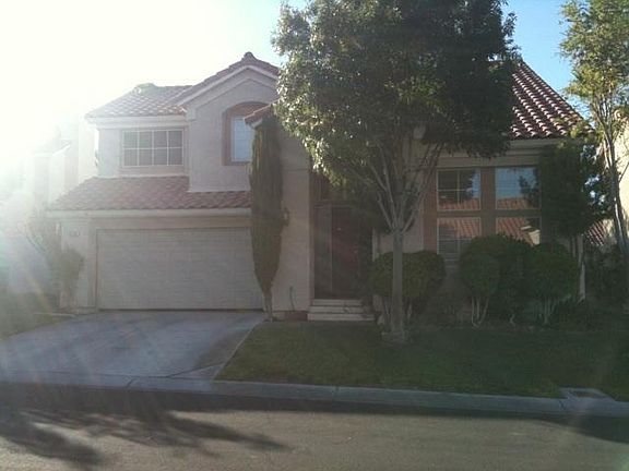 Front of house on Rainbow Falls with windows that let lots of morning sun in to brighten your home.