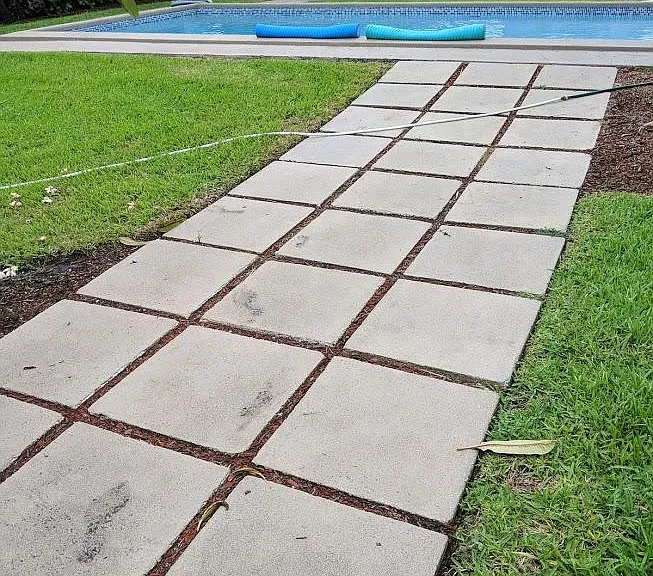 These stepping stones have been removed and pavers are being professionally installed now.