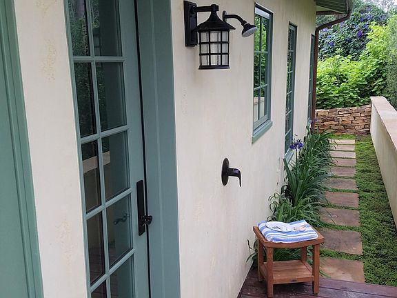 Back door with outside heated shower
