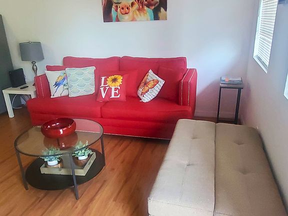 Inviting living room with elegant decor and abundant natural light.