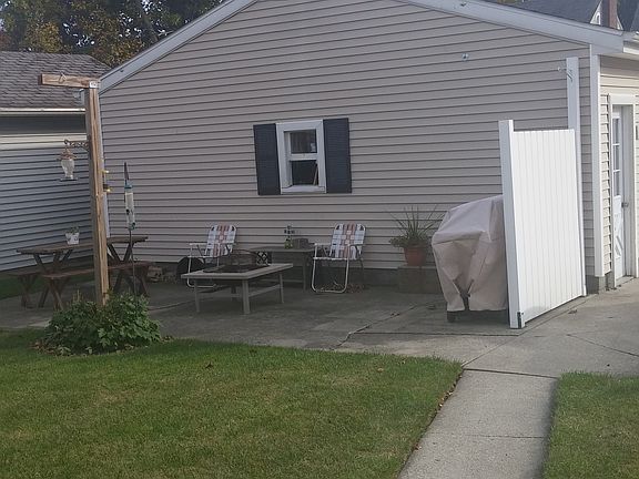 Patio beside garage