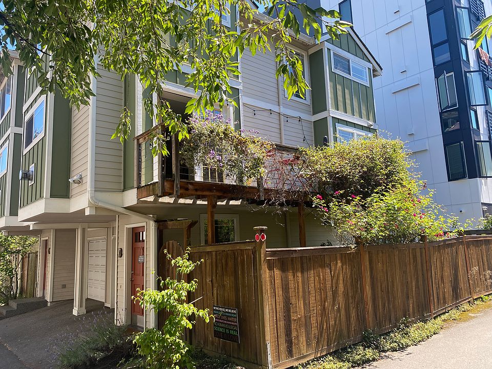 Corner Unit abutting alley, provides lots of sun for garden and deck!