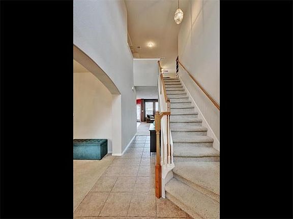 Tiled Foyer with Formal Dining on the left