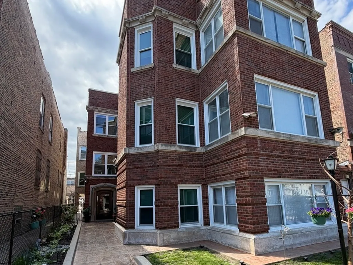 Building Photo - 7304 S Emerald Ave #1R