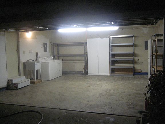 Two car garage with entrance to the house