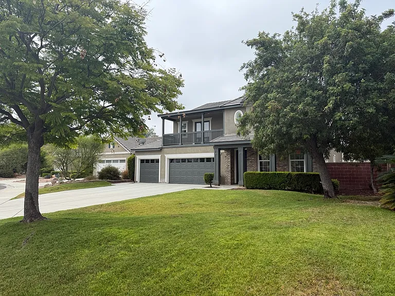 Large front yard and drive way