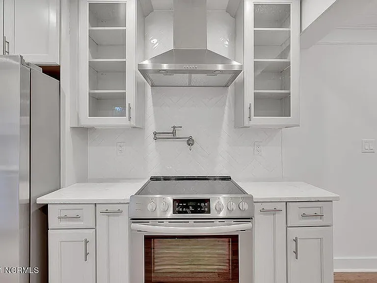 *original listing photo from when we purchased the home (kitchen)
