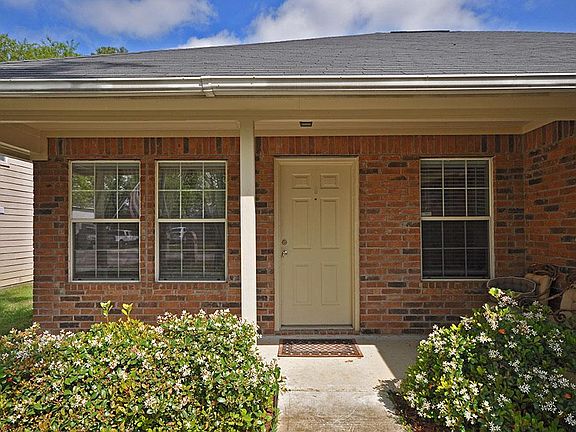 Covered front porch offers shade. Another great spot to get to know your new neighbors!