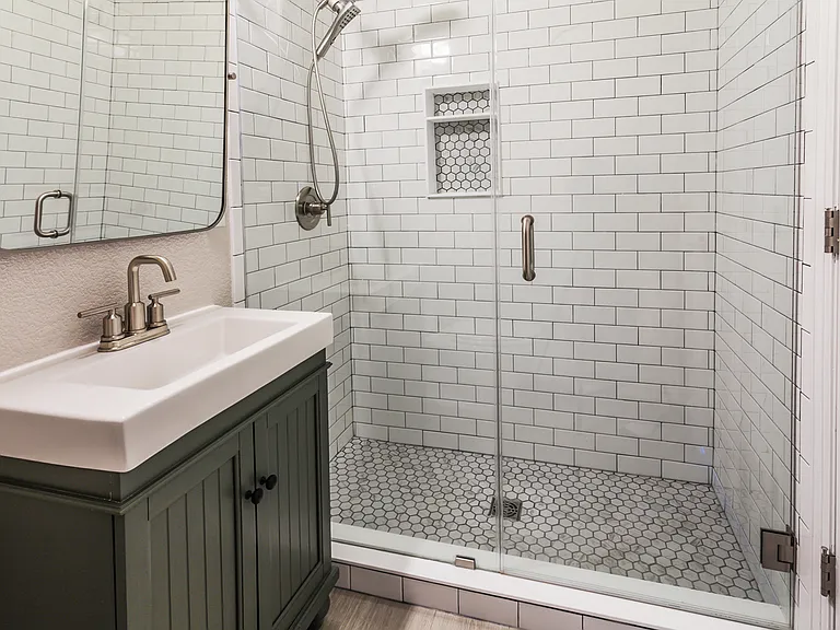 First-level bathroom with shower.