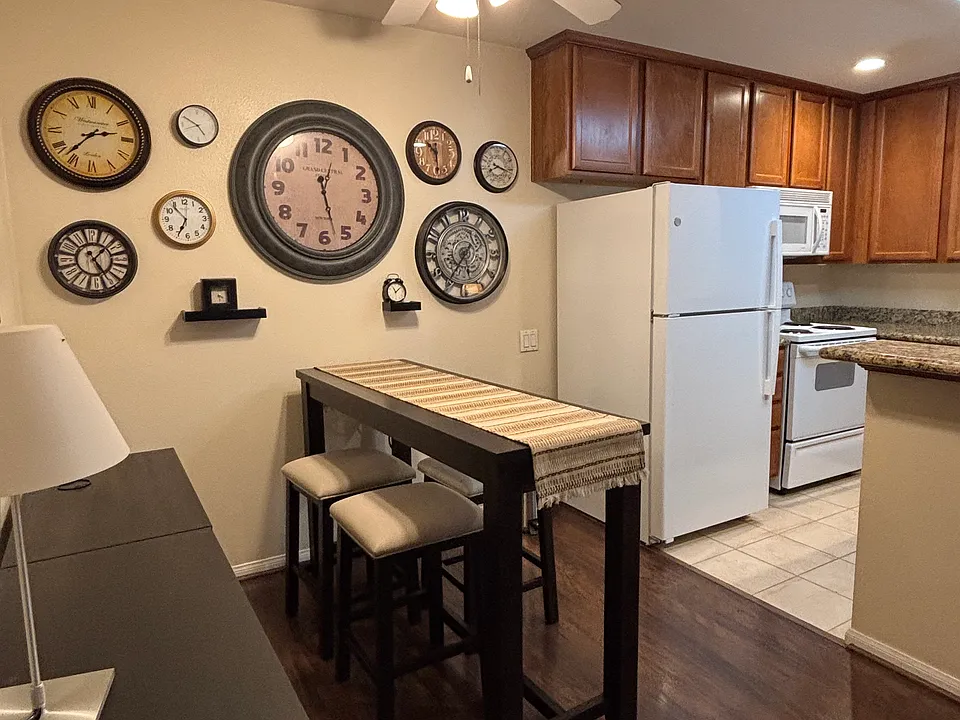 Dining area with bar table and stools