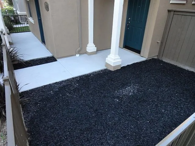 Front entry, door to house and door to living room on the left side