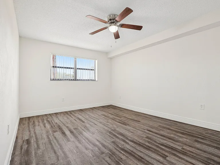 Large Bedroom Space with Ceiling Fan