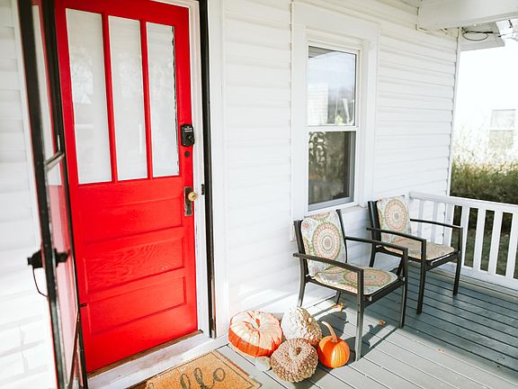 Welcome home! Enjoy the front porch with seating included in rental.