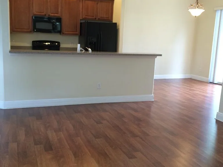 partial living room looking at kitchen