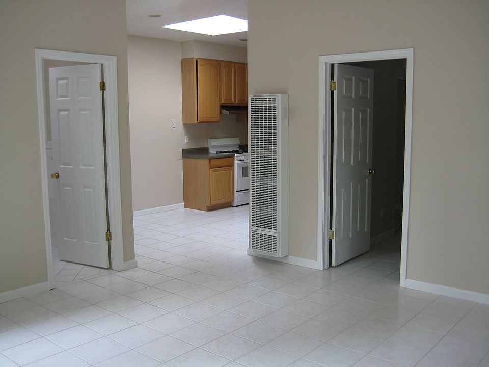 door to bathroom, kitchen, door to bedroom