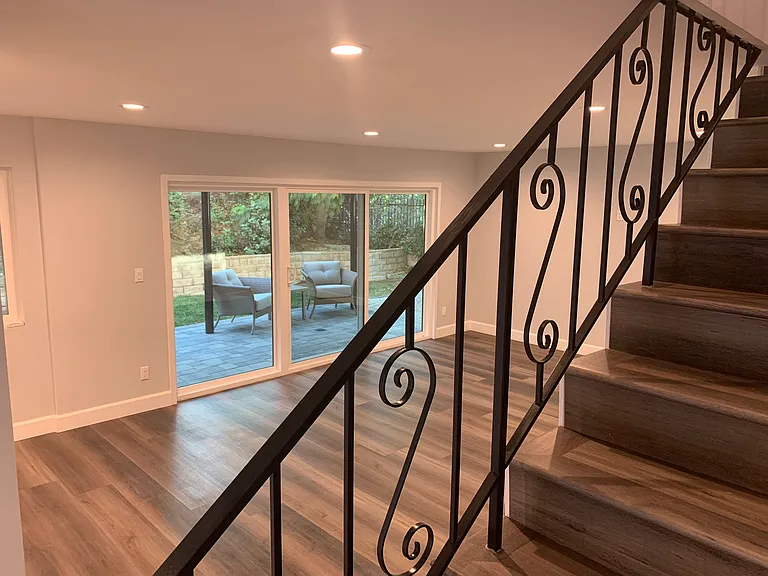 view of den on way up to 2nd level which offers 3 bedrooms, 2 full bathrooms