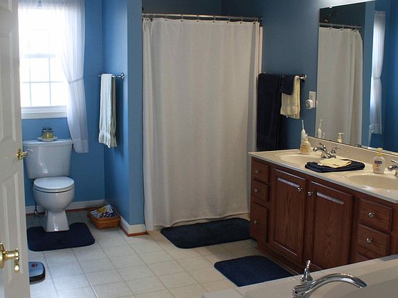 Master Bath with walk-in closet and garden tub