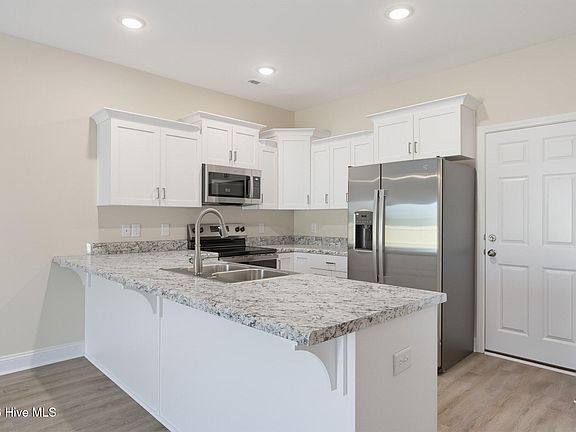 5th image of 303 Coastal Reef Court