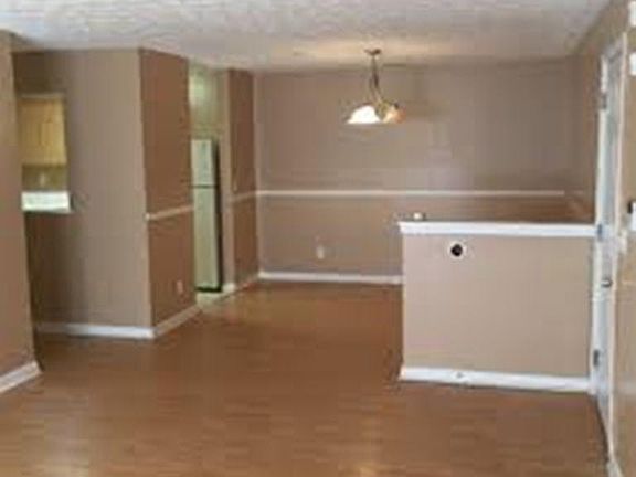 Front Entrance into Living Rm and Dining Rm