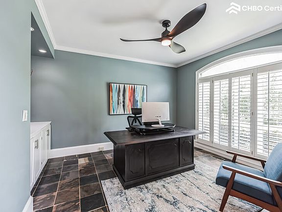 Bright and inviting home office, located off the front foyer