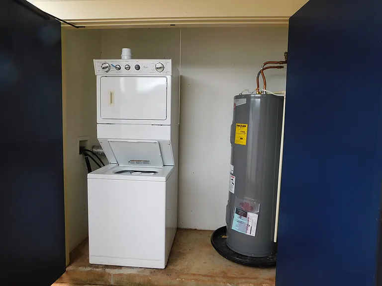 Larger capacity stacked laundry center. Water heater