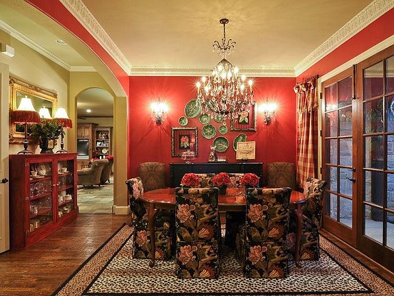 Dining room with lovely chandelier and subdued lighting features