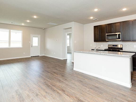 Dining Area to Kitchen and Family Room