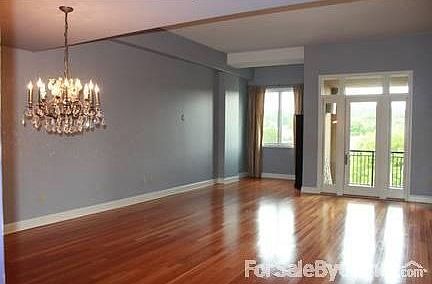 Living Room-beautiful hardwood floors
						:
						Large spacious livingroom w/great view of Vulcan!