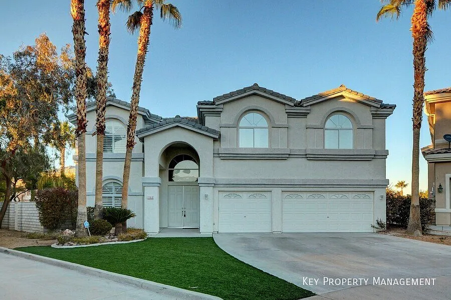 Guard-Gated Luxury in The Grand Legacy: 5-Bed Golf Course Home with Waterfall Pool — Photo 1