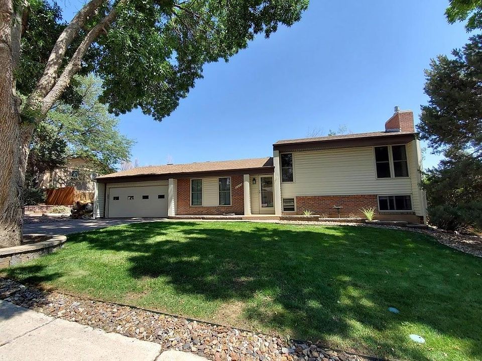 Front yard with garage