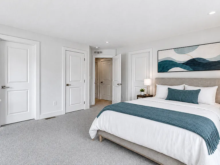 Primary suite with large walk in closet and dual sink ensuite bathroom
