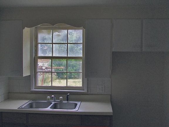 Cabinets Refinished, New Fixtures