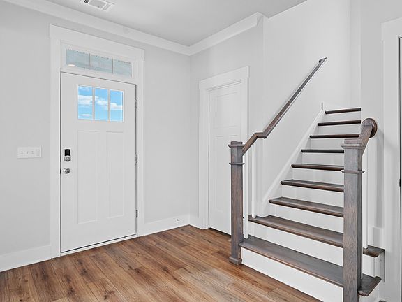 2 story single family home, all white with an open concept design