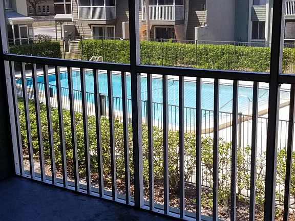 Screened in patio close to pool 