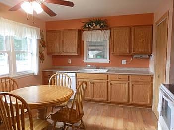 Eat-in kitchen with newer cabinets plus major appliances