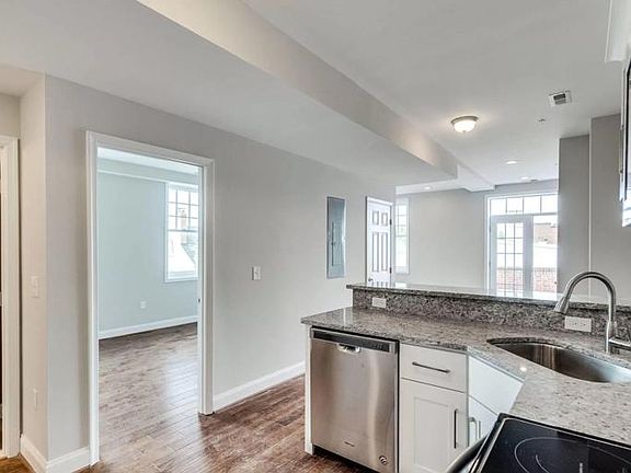 Bedroom on left of kitchen