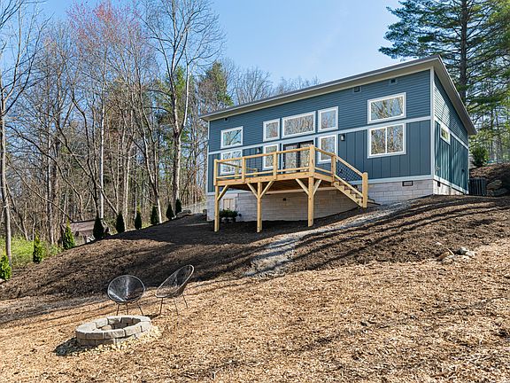 Backyard view, shows firepit
