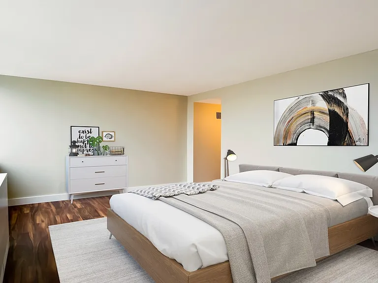 Spacious bedrooms feature large windows, Karndean wood plank flooring and large closets