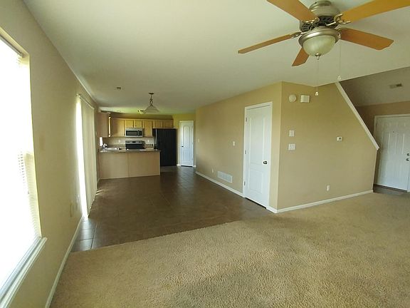 Living room and Kitchen (First door is the closet on picture
