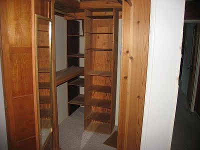 Walk in closet with shelves